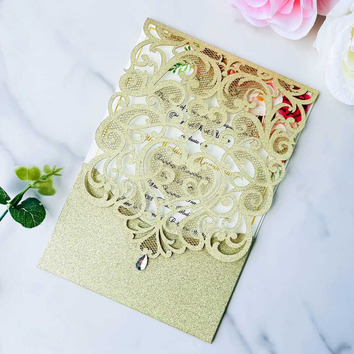 Hosmsua 50PCS Personalized Wedding Invitations Kit 5.12 x 7.3 Laser Cut Hollow Rose Rhinestone Pocket with Envelope for Wedding Quinceanera Invite (Champagne Gold Glitter)